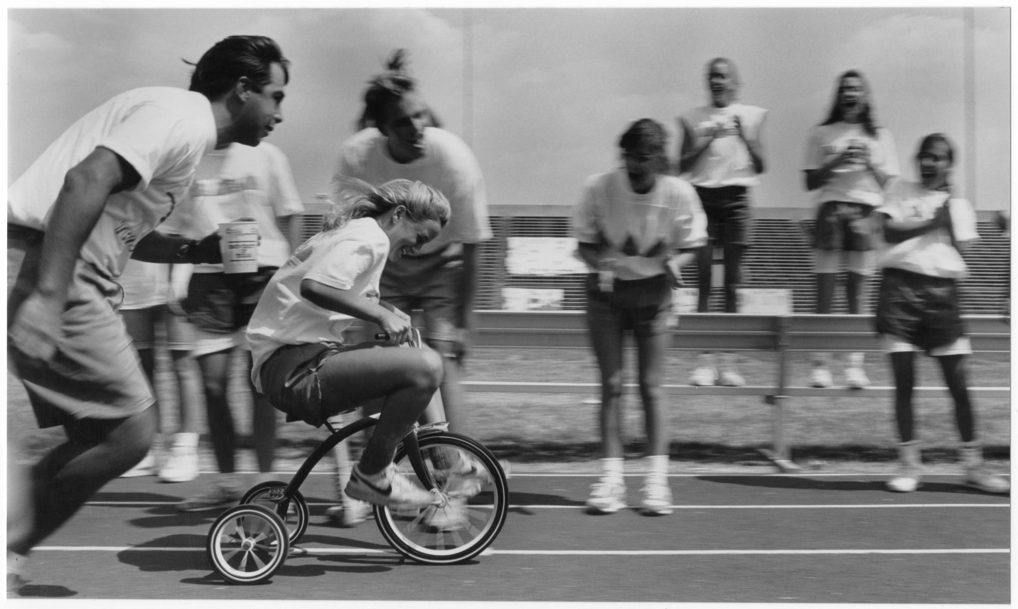Daily Texan (1990 #2) - Tricycle Race